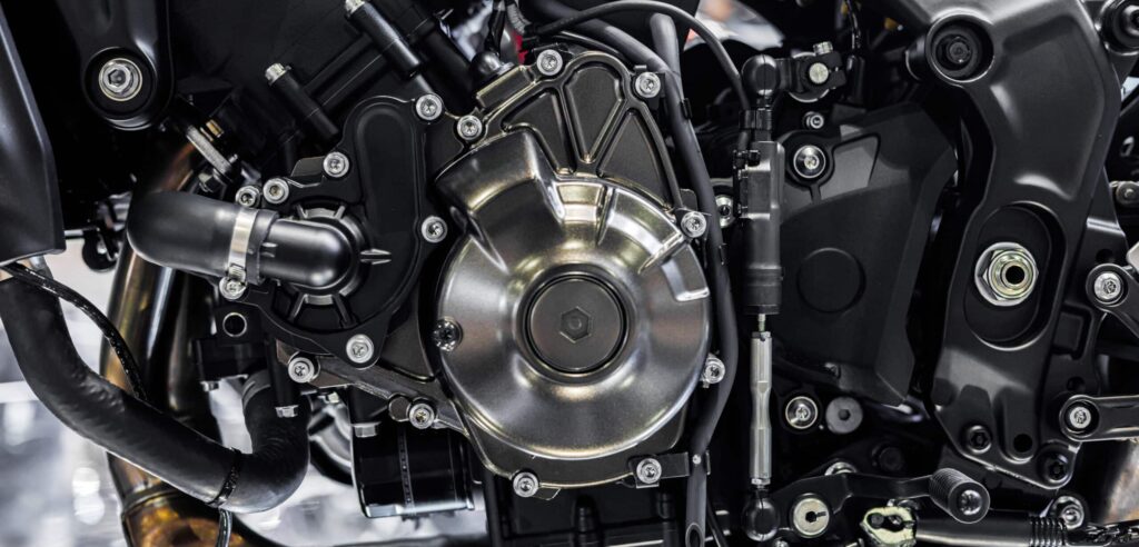 Closeup modern high Performance racing motorcycle engine metal part