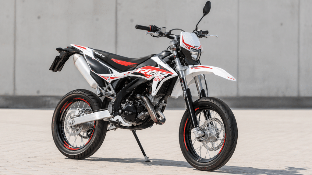 Beta RR or Rieju 50cc mecaboite parked outdoors, a beginner motorcycle for young riders