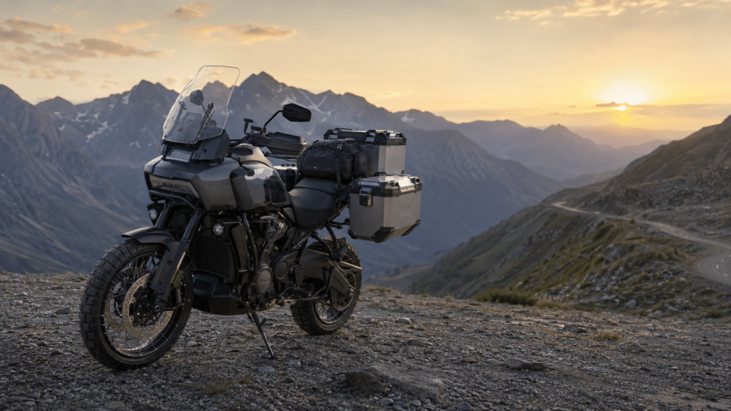 photorealistic, Harley-Davidson Pan America 1250 Limited loaded with aluminum panniers on a scenic mountain pass at dawn, sense of real world adventure touring, soft morning light, landscape emphasizing long distance travel capability, no rider visible, no watermark