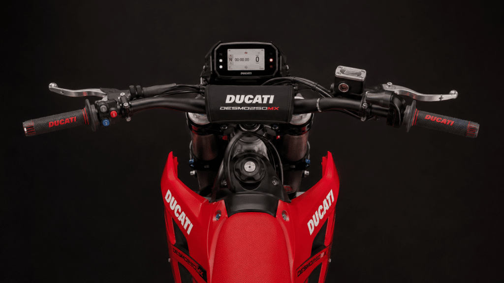 photorealistic, Ducati Desmo250 MX detailed cockpit view showing the handlebar controls and minimal electronics display, sense of race-focused minimalism with hidden high-tech electronics, clean studio lighting emphasizing the handlebar setup, no rider, no watermark